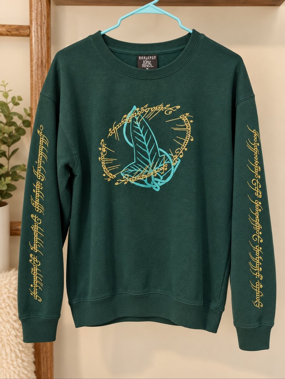 Dark Green Graphic Crewneck Sweatshirt with Teal and Gold Design